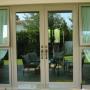 Puerta batiente doble Residencial