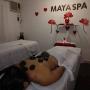 MASAJE CON PIEDRAS CALIENTES