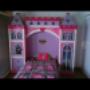Subido por visitante en 18/08/2015 - cama individual con cabecera tipo castillo que contiene dos torrea con cajones puertas y repisas