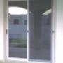 Puerta corrediza de aluminio con mosquitero