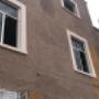trabajos con un Andamio remodelando una casa