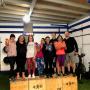en competencia
