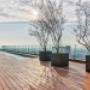 Pool and deck with views of the city.