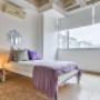 Bedroom with large windows