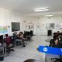 Team members working on freight forwarding solutions in Acuna office