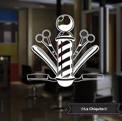 Peluqueria Y Barberia La Chiquita.