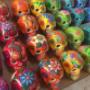 Mexican ceramic skulls handpainted in Guerrero Mexico by our skilled artisans. Ship worldwide for homes and events.