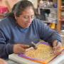 Yuri, one of the amazing Mexican Artisans that creates the ArtMexico collection of Mexican decorations.